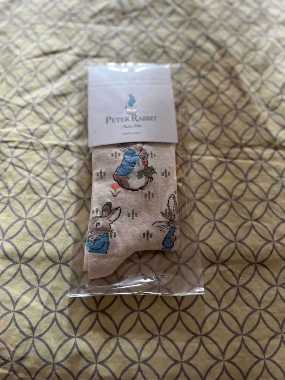 Out of Print Beige Peter Rabbit Novelty Socks with Blue Accents